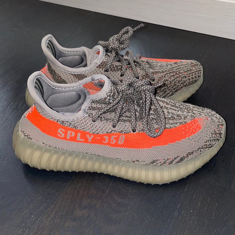 Grey yeezy with orange stripe